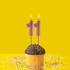 Birthday on a yellow background - Number 11 candle