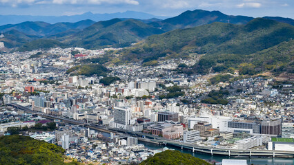 Panoramic view of part of Nagasaki City, Japan, as seen from Mount Inasa summit.