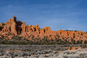 Fototapeta premium entrance to Red Canyon, Panguitch, Garfield County, Utah. Claron Formation, (Tcp) Pink member. Claron Formation, (Tcp) Pink member; with Stream alluvium. Sevier fault