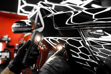 Car paint inspection using detailing inspection light before polishing or ceramic coating. Swirl...
