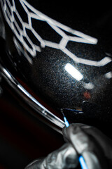 Touch-up paint applying to car chip using fine micro brush to prevent rust and restores the car...