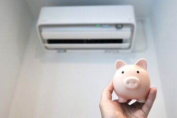 エアコンと貯金箱で節約を意識する電気代対策