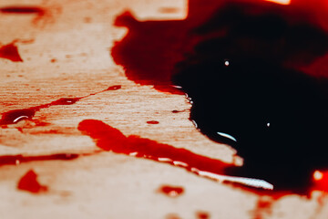 Blood Dripping and Splattering on Wood Surface. dark red blood and blood blisters.Creepy bloody...
