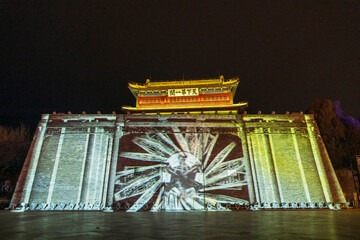 Shanhaiguan Great Wall at night， The word in the photo translates as 