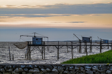 Sunset of Fishing huts over Randonnee entre Histoire et Nature, Fouras, Fouras-les-Bains, Charente-Maritime, Nouvelle-Aquitaine, France, Europe	