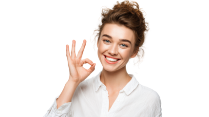 Young woman smiling and showing OK gesture, white isolated background