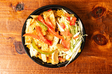 Mashed plantain bowl with chicken and vegetables