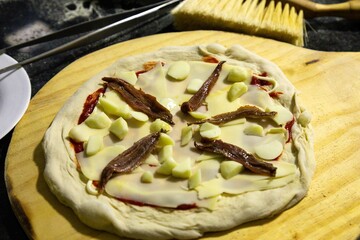 The most authentic Neapolitan pizza with anchovies, anchovies from the Mediterranean Sea, extra virgin olive oil and buffalo mozzarella cheese