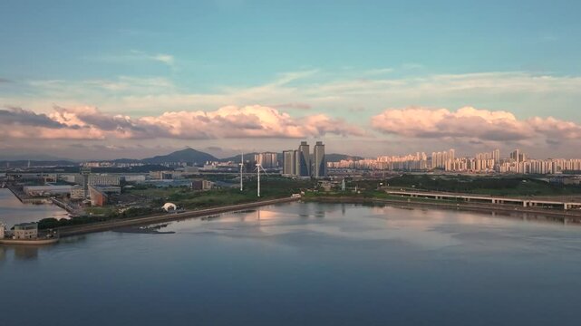 Hyperlapse sea of Sunrise sky, Aerial view Drone flies over clouds, Yeongjongdo,Yeongjong Bridge, Incheon, South Korea Nature and travel background concept