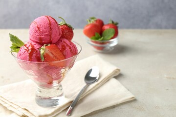 Tasty sorbet with strawberries and mint served on light table, closeup. Space for text