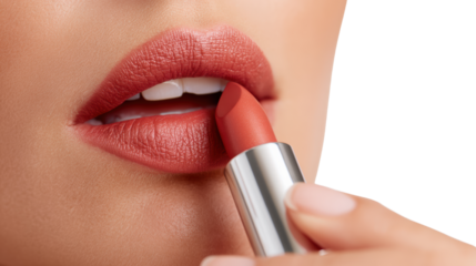 Close-up of a woman applying lipstick to her lips for a glamorous look on a white isolated background.