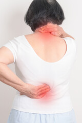 Elderly woman having back body ache for concepts of Back Muscle Strain, Piriformis Syndrome, Low...