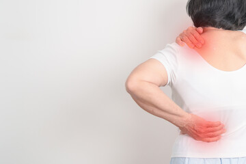 Elderly woman having back body ache for concepts of Back Muscle Strain, Piriformis Syndrome, Low...