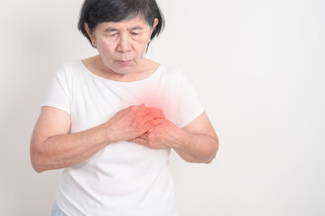 Elderly Woman having chest pain for Heart disease, angina disease and symptom heart attack disease...