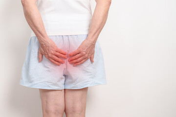 elderly Woman having Anal symptoms pain for Hemorrhoids disease, Constipation, Anal cancer...