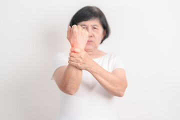 Elderly  Woman having wrist pain for Carpal Tunnel Syndrome, Wrist Tendinitis, muscle ache, De...