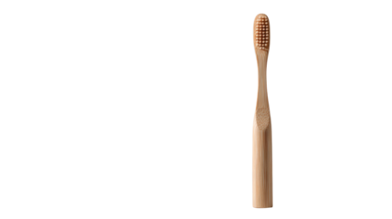 Natural bamboo toothbrush on white isolated background, eco-friendly dental hygiene.