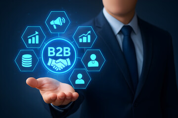 Businessman presenting innovative B2B digital strategies and growth concepts on a futuristic interface.