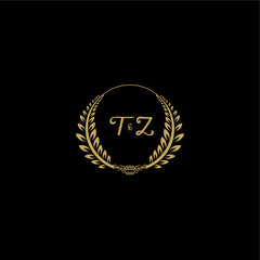 Naklejka premium TZ beautiful feminine and elegant wedding monogram initial logo with circle floral gold