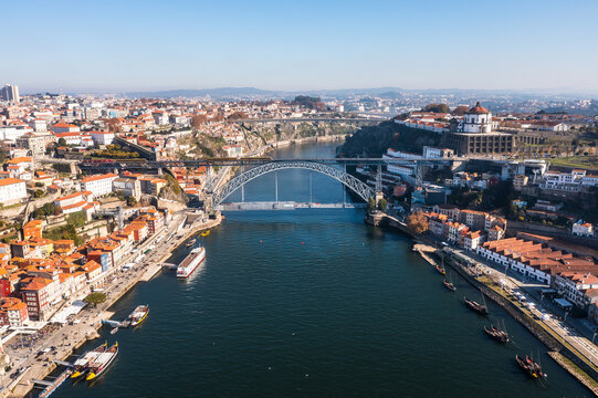 Cityscape of the city of Porto, including the Douro river and the Dom Luis I bridge (Ponte de Dom Luís I). Porto, Portugal.