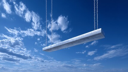 Swinging Metal Bar Against Clear Blue Sky with Fluffy White Clouds