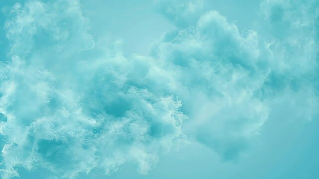 Dreamy blue clouds slowly float and swirl creating a calming atmosphere