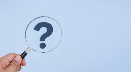 International ask a question day concept, Magnifying glass focused on question mark, Answer, Q&A, Communication and Brainstorming