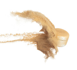 Cosmetic container white bottle fly splashing in mid air. Moisturizer lotion cream bottle explosion flying with sand powder dust under dry sun. White background isolated high speed shutter freeze