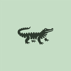 Crocodile logo in bold and clean silhouette design.