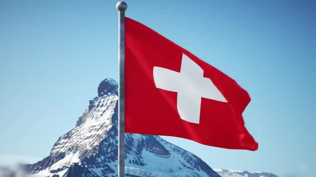 Majestic mountain scene with flag ascending under sparkling morning light