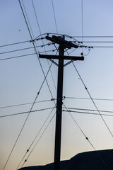 Phone lines criscross in the desert