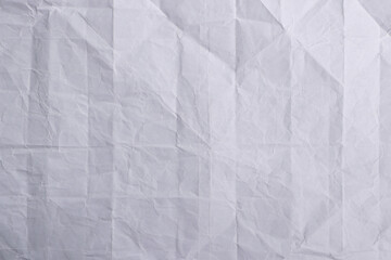 Folded Wrinkled White Paper Texture Background

