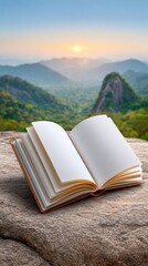 Open Blank Book on Rock with Scenic Mountain View at Sunrise