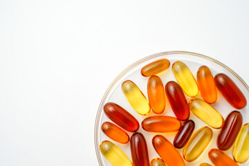 Vitamins capsules, fish oil, soft gels, supplements, omega 3, omega 9, vitamin D, vitamin E