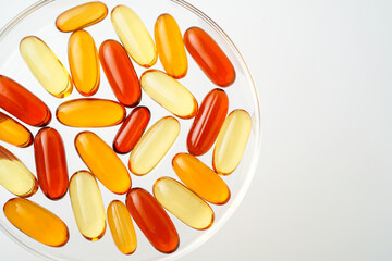 Vitamins capsules, fish oil, soft gels, supplements, omega 3, omega 9, vitamin D, vitamin E