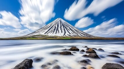 Serene Icelandic landscape with snow-capped mountain and ethereal water movement