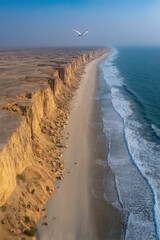 aerial view of coastal cliff in saudi arabia at sunrise