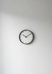 Modern design wall clock hanging on white wall