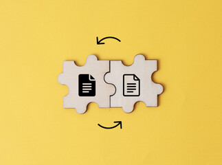 two squares with two converted file icons. data or information storage. the concept of exchanging...