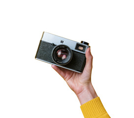 vintage camera held in hand on white background.