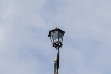 Minimalist photograph of a vintage lamppost for a background or poster design in a classic urban style