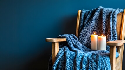 Cozy Winter Scene, Lit Candles on Knit Blanket Draped Wooden Chair