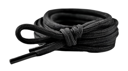 Black waxed shoelaces rolled up close up