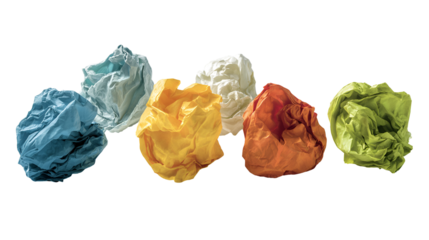 Colorful crumpled paper balls on black background