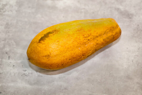 Close-up view of a papaya maradol isolated.