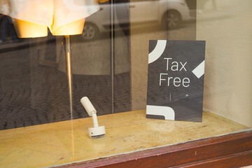 Window display with tax free sign in shopping district
