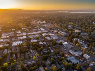 Aerial view of Menlo Park, California, USA, at sunset. The photo shows the city's layout, with...
