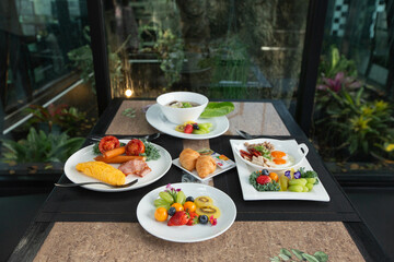 Full American Breakfast Huge healthy breakfast spread on a table with coffee Breakfast served with coffee English breakfast fried egg croissants