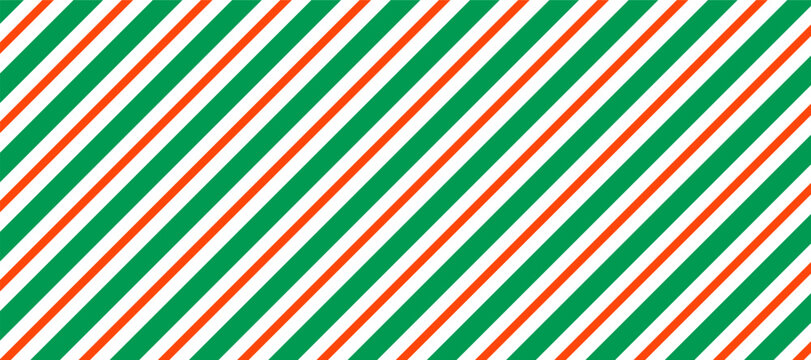 Bold vector pattern featuring diagonal stripes in green, orange, and white, creating a vibrant and energetic visual perfect for backgrounds, textiles, or modern design elements.