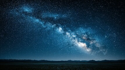 A vast night sky filled with stars and the Milky Way.